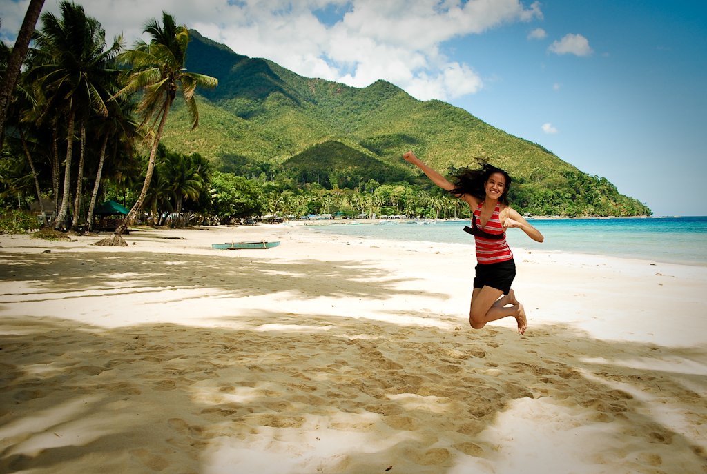 Trying to punch away reality to live in a fantasy dream at Sabang Beach, Puerto Princesa, Palawan