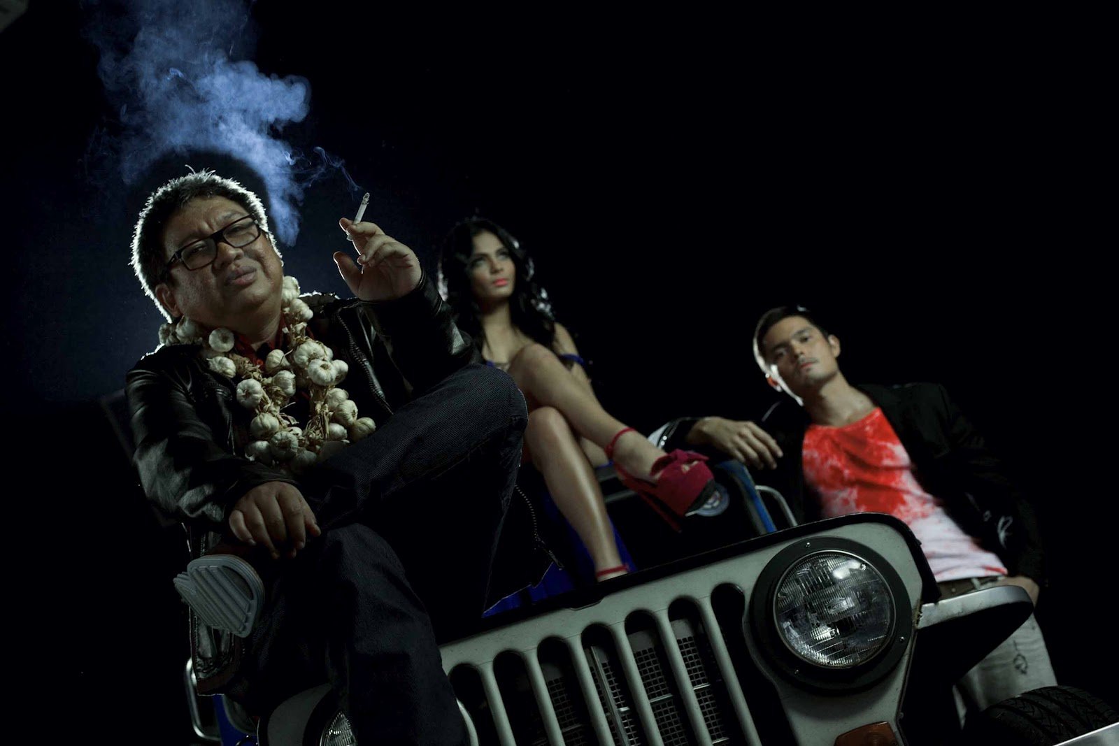 Director Erik Matti with Tiktik: The Aswang Chronicles lead stars Lovi Poe and Dingdong Dantes