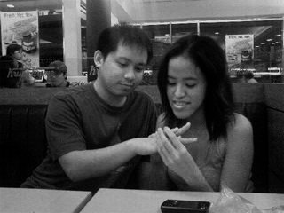 dsc002051 Before (or after?) his Birthday at Krispy Kreme GH. Kunwari hinuhulaan ko siya LOL