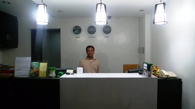 Sir Henry of Jupiter Suites Makati welcomed us with a smiling face =)
