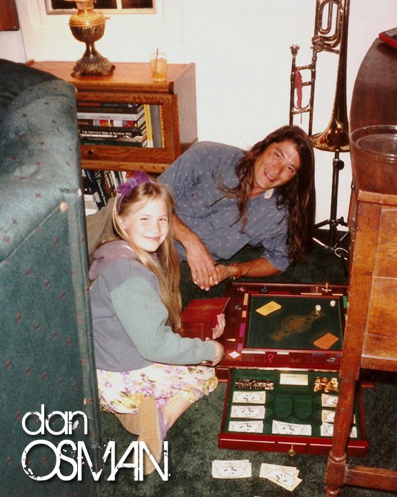 Dan Osman playing Monopoly with daughter Emma